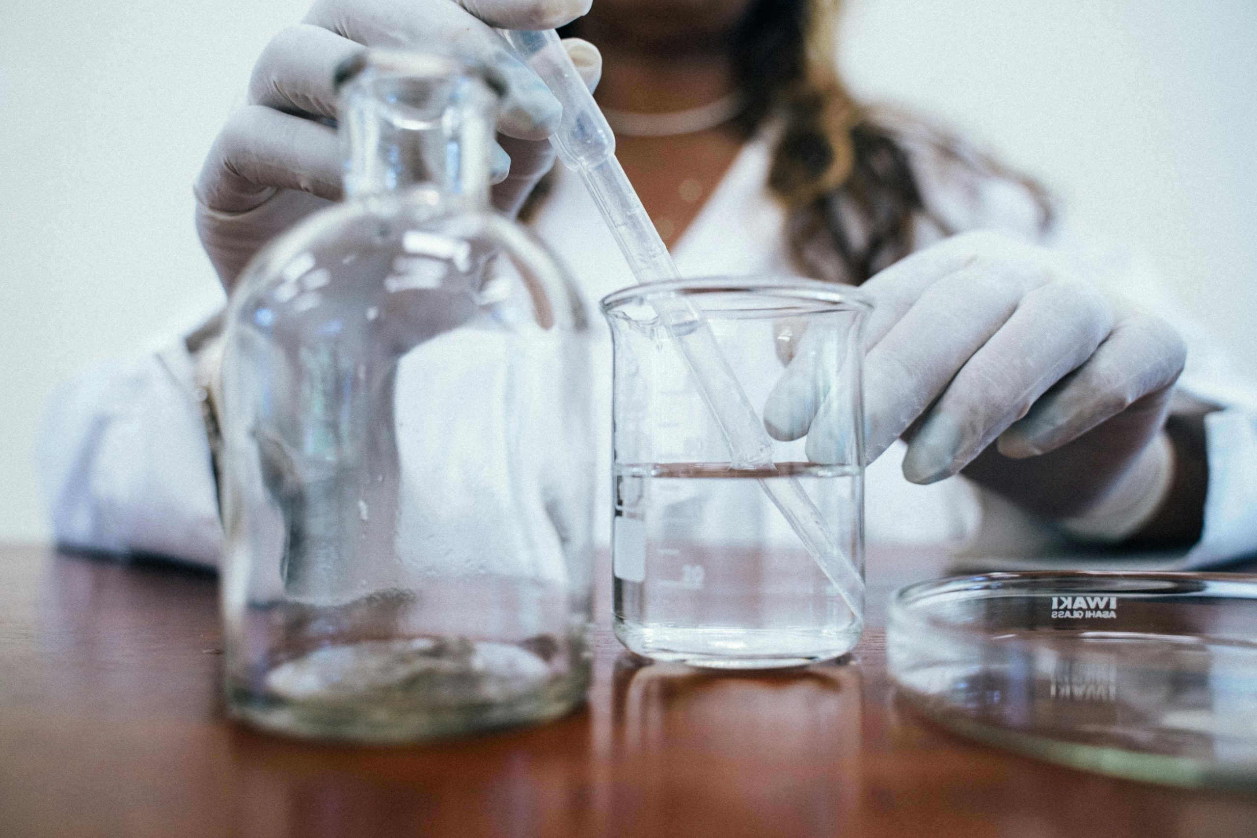 Laboratory scientist preparing beaker