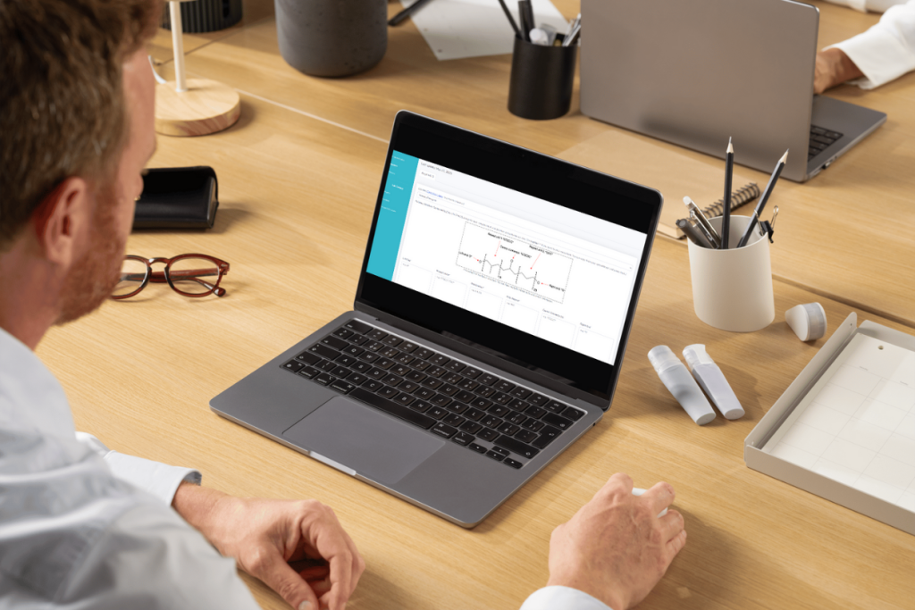 Scientist using ArophaAI for in silico biodegradation testing.